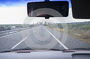 Driving on a highway in the rain