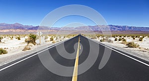 State Highway Asphalt Drive Panaming Springs Death Valley Desert National Park Landscape California USA Mountains