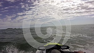 Driving a jet ski on a rough wave water Sea on a Mediterranean Sea in Costa Brava, Catalonia