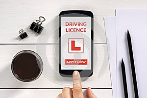 Driving licence app mock up on smart phone screen with office ob