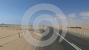 Driving on Luderitz to Walvis Bay coastal Road next to Namib Desert