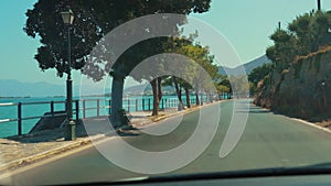 driving on the magnificent road to Agios Nikolao, picturesque coastal town located on the northeastern part of the