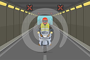 Driving motorcycle. City highway tunnel road. Front view of a motorcycle rider.