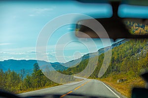 Driving on a mountain road on a sunny day