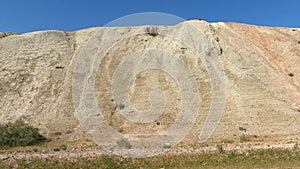 Driving through mountain and rocky landscape.