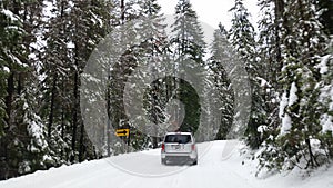 Driving mountains off-road snowstorm winter