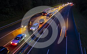 Driving at night, traffic jam go to city, light trails at night