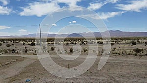 Driving through the outskirts of Uyuni in Bolivia. Deserted terrain near the Uyuni Salar.