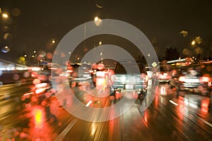 Driving in the rain on freeway at night photo