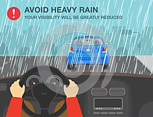 Driving on a rainy and slippery road. Avoid heavy rain, your visibility will be greatly reduced. Hands driving steering wheel.