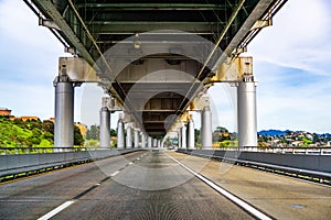 Driving on Richmond - San Rafael bridge John F. McCarthy Memorial Bridge, San Francisco bay, California photo
