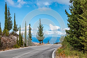 Driving road on Lefkada island sea coast, Greece