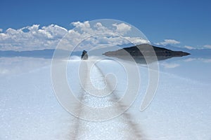 Driving through salar de uyuni photo