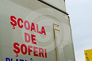 Driving school (scoala) sign, romanian driving school car sign.