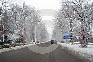 Driving in the snow in winter in the Netherlands