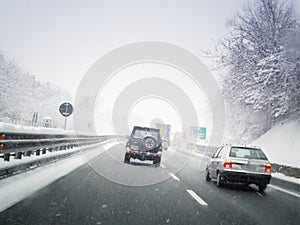 Driving through the snowy road