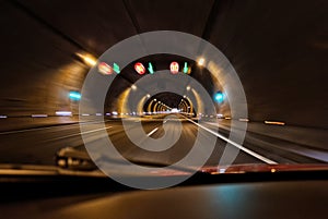 Driving through Spanish road tunnel. Motion blur.