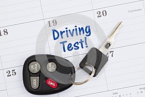 Driving test message with monthly calendar with car keys