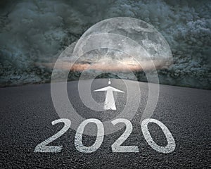 Driving to upcoming 2020 towards the storm at night