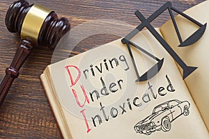 Driving Under Intoxicated DUI Law is shown on the photo using the text