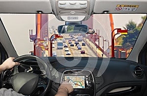 Driving using navigation system, Golden Gate Bridge, San Francis