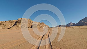 Driving through Wadi Rum desert in Jordan