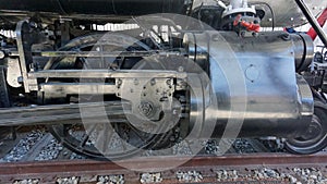 Driving wheel and pistons of steam locomotive, built in 1900, Tucson, Arizona