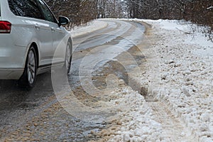 driving in winter after a snowfall, ice on the road, temperatures below zero