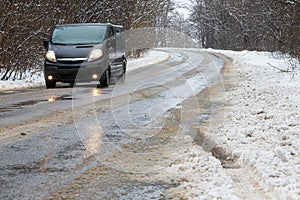 driving in winter after a snowfall, ice on the road, temperatures below zero