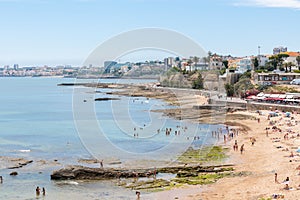 Droen shot of the beach of Poca and the Fort of Sao Teodosio da Cadaveira in Estoril, Portugal photo