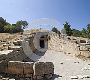 Dromos entrance to the Treasury of Atreus in Mycenae, Greece