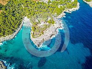 Drone above bay Punta de Sa Guardia Cala Mondrago Mallorca