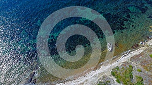 Drone aerial image of rocky wild beach in Porquerolles, France