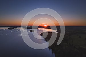 Drone/aerial image taken during sunset over Lake Muskoka. Located near Bracebridge, Ontario, Canada.