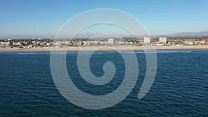Drone Aerial Over the Pacific Ocean at Huntington Beach California Flying Along Coast