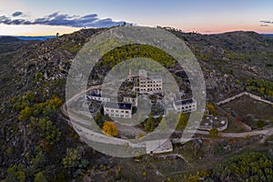 Drone aerial panorama of Termas Radium Hotel Serra da Pena at sunset in Sortelha, Portugal photo