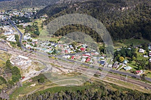 Drone aerial photograph of houses near a trainline in regional Australia