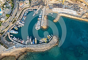 Drone aerial scenery fishing port at pernera Protaras Cyprus. Fishing boats moored in the harbour