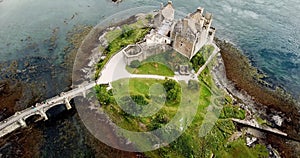 Drone aerial video of the Eilean donan castle and loch duich Highlands Scotland travel