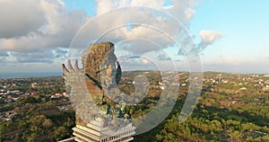 Drone Aerial view 4k Statue of Vishnu in Garuda Wisnu Kencana. bali, indonesia.