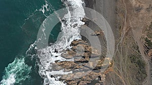 Drone aerial view of arco Calan coast near Constitucion Chile, Pacific ocean, Top view