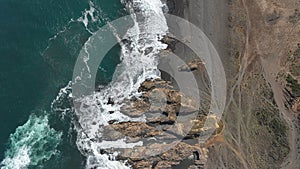 Drone aerial view of arco Calan coast near Constitucion Chile, Pacific ocean, Top view photo