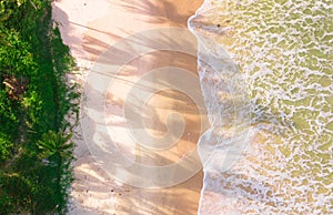 Drone aerial view beach waves at sunset