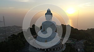 Drone Aerial view of Big Buddha is Landmark on sunset in Phuket Thailand