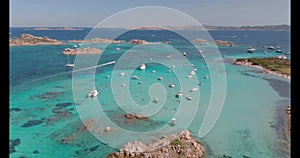 Drone aerial view of boats in Maddalena Archipelago, Sardinia, Italy.
