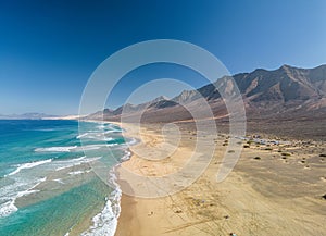 The drone aerial view of Cofete beach in Fuerteventura Island, Canary Islands, Spain.