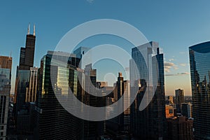 Drone, aerial view of downtown Chicago during a beautiful summer sunset