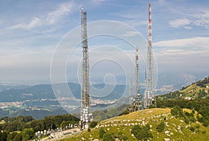 Drone aerial view of a group of towers for telecommunications, television broadcast, cellphone, radio and satellite