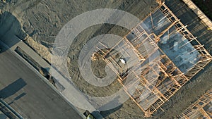 Drone Aerial View of Home Construction Site Foundations and Frame