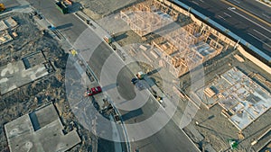 Drone Aerial View of Home Construction Site Foundations and Framing